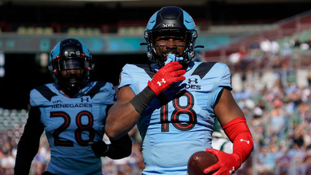Mar 5, 2023; Arlington, TX, USA; Arlington Renegades linebacker Donald Payne (18) reacts after a fund recovery against the Orlando Guardians during the first half at Choctaw Stadium. Mandatory Credit: Raymond Carlin III-USA TODAY Sports  